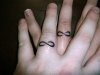 1370594081562134_63_wedding_ring_tattoo_designs_2.jpg