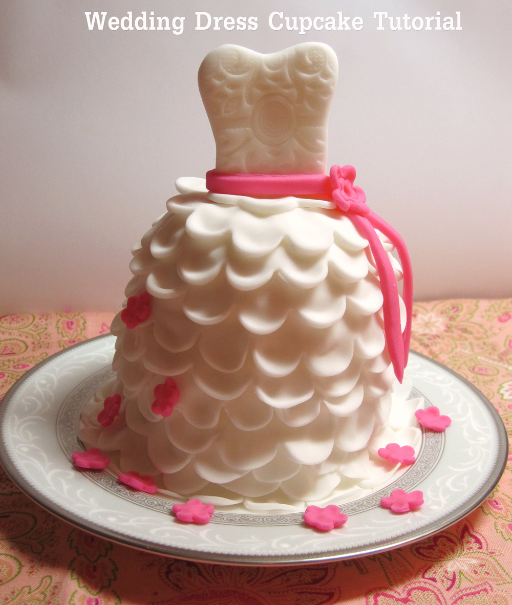 fondant-wedding-dress-cupcake-with-letters.jpg