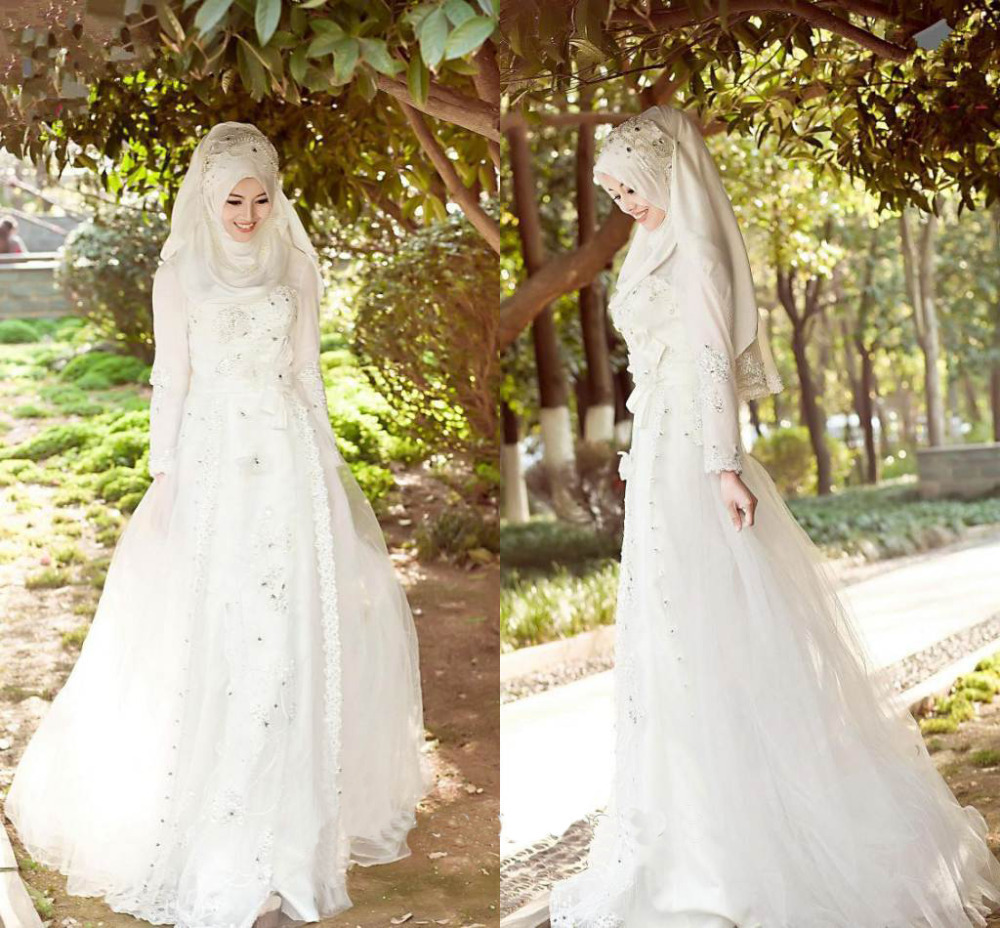 Arabic-Muslim-Wedding-Dresses-2015-Weddings-Events-Beaded-Long-Sleeves-A-line-Abaya-Muslim-Wedding-Dress.jpg