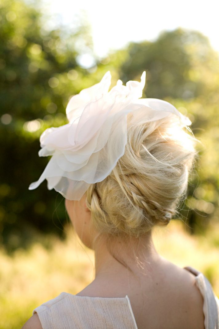 chic-chignon-bridal-updo-with-romantic-hair-flower-braid__full.jpg