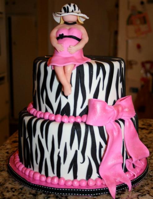 Two+tier+zebra+stripe+cake+with+pregnant+woman+topper.JPG